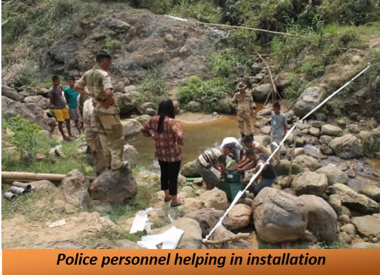 Police personnel helping in installation